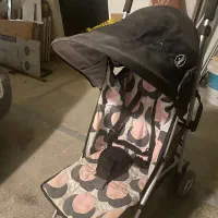 کالاسکه ی بچهبرند My Babiie که پارچه‌ صورتی و سیاه