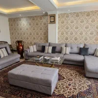 مبل مدرن ال شکل طوسی همراه با پاف