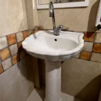 رشو اینه شیر‌دسشویی