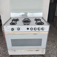 اجاق گاز فر دار  با جوجه گردون سینجر گاز