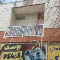 فروش آپارتمان ۹۰ متری ویک باب مغازه واقع قلعه ملا
