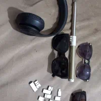 عینک ومونوپادو فلش وهدفون وچراغ شارژی