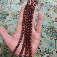 تسبیح کهربای کهنه|کلکسیون اشیاء عتیقه|آفتاب, |دیوار