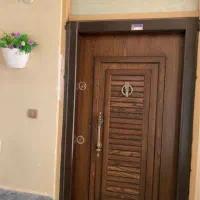 اپارتمان ۲خواب همکف۹۳مترباکمددیواریهای شیک