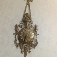 ساعت برنجی سنگین وزن