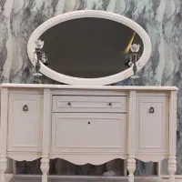 آینه و کنسول و شمعدان