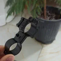 نگهدارنده چراغ قوه و دوربین