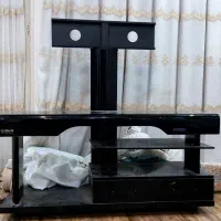 زیر تلویزیونی شیشه ای