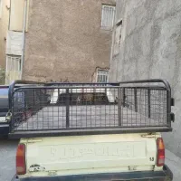 یک دستگاه وانت پیکان کفی مبلی