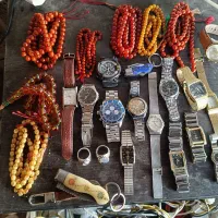 ساعت و تسبیح و چاقو انگشتر