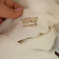حدود ۶۰ متر پارچه کرپ کش کنزو سفید