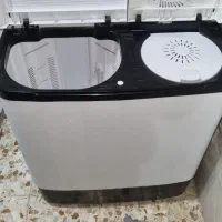 یک عددماشین لباسشوی تمیزدوقلو،ماشین دوقلو خشکن دار