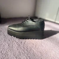 کفش مجلسی|کیف، کفش، کمربند|قم, چهل درخت‎|دیوار