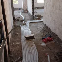 اجرای لوله کشی  و نصب شیرآلات پمپ و منبع