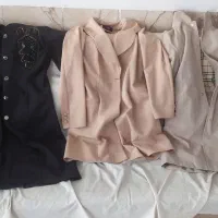 سه عدد مانتو و مقداری تاپ و دامن نخی