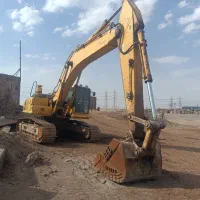 جذب راننده لودر و بیل زنجیری