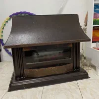 بخاری گازی طرح شومینه