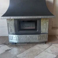 بخاری گازی ایران گاز طرح شومینه در حد نو