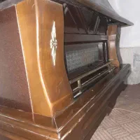 بخاری طرح شومینه پایه چوبی|بخاری، هیتر، شومینه|فردیس, شهرک راه آهن|دیوار