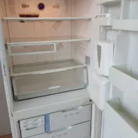 یخچال اسنوا بالا معمولی وپایین فریزر