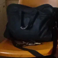 کیف حاوی مدارک گم شده در میانه