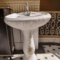 روشویی همراه با شیر قهرمان