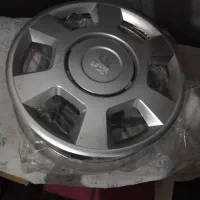 قالپاق پژو پارس و یک آفتاب گیر شیشه عقب ۲۰۶