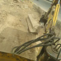 بیل بکهو حفاری کانال و خاکبرداری