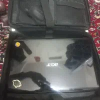 لبتاب ایسر کارکرده به همراه کیف چرم