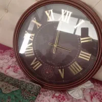 بوفه طلایی وساعت دیواری