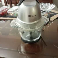 یگ دستگاه آب مرکبات گیری مارک بران و یگ خورد کن