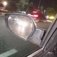 اینه بغل کوییک ترک دارد