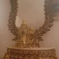 اینه کنسول و ساعت رو میزی