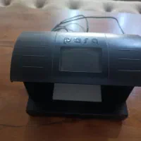 دستگاه تشخیص چک پول تقلبی