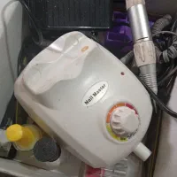 دستگاه کاشت ناخن
