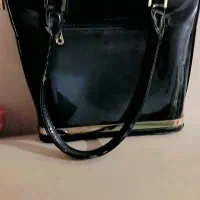 کیف|کیف، کفش، کمربند|بندر گناوه, |دیوار