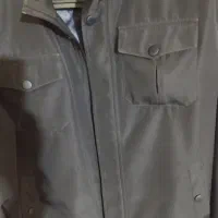 کاپشن رنگ سرمه آیی در حد نو هست و۱۰۰متر