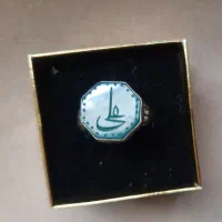 انگشتر نقره دستساز و کیف اداری تمام چرم اصل گاوی