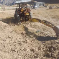 بیل بهکویی  پشت تراکتوری فرگوسن رومانی