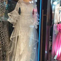 یک عدد لباس مجلسی و عقد