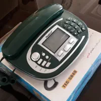 دو عدد تلفن و یک عدد شماره انداز با آداپتور