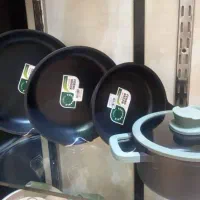 قابلمه و تابه بلژیکی مارک برگهف|ظروف پخت‌وپز|شیراز, فرهنگ شهر|دیوار
