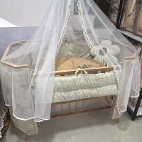 تخت نوزادی کنار مادر