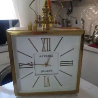 ساعت رو میزی رو کنسولی و گلدان