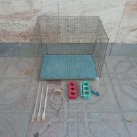 قفس پرنده و فوتبال دستی