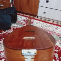 ساز قوپوز|سازهای سنتی|قرچک, زیبا شهر|دیوار