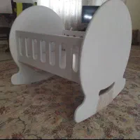 تخت گهواره ای نوزاد