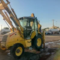 تخریب با لودر بیل بکهو و بیل مکانیکی خاکبرداری