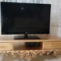 تلویزیون ال جی 42 اینچ و میز تلویزیون