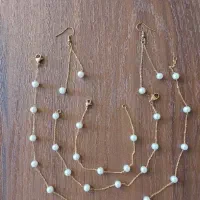 سرویس مرواریدی و سنگ کریستال رنگ ثابت تضمینی